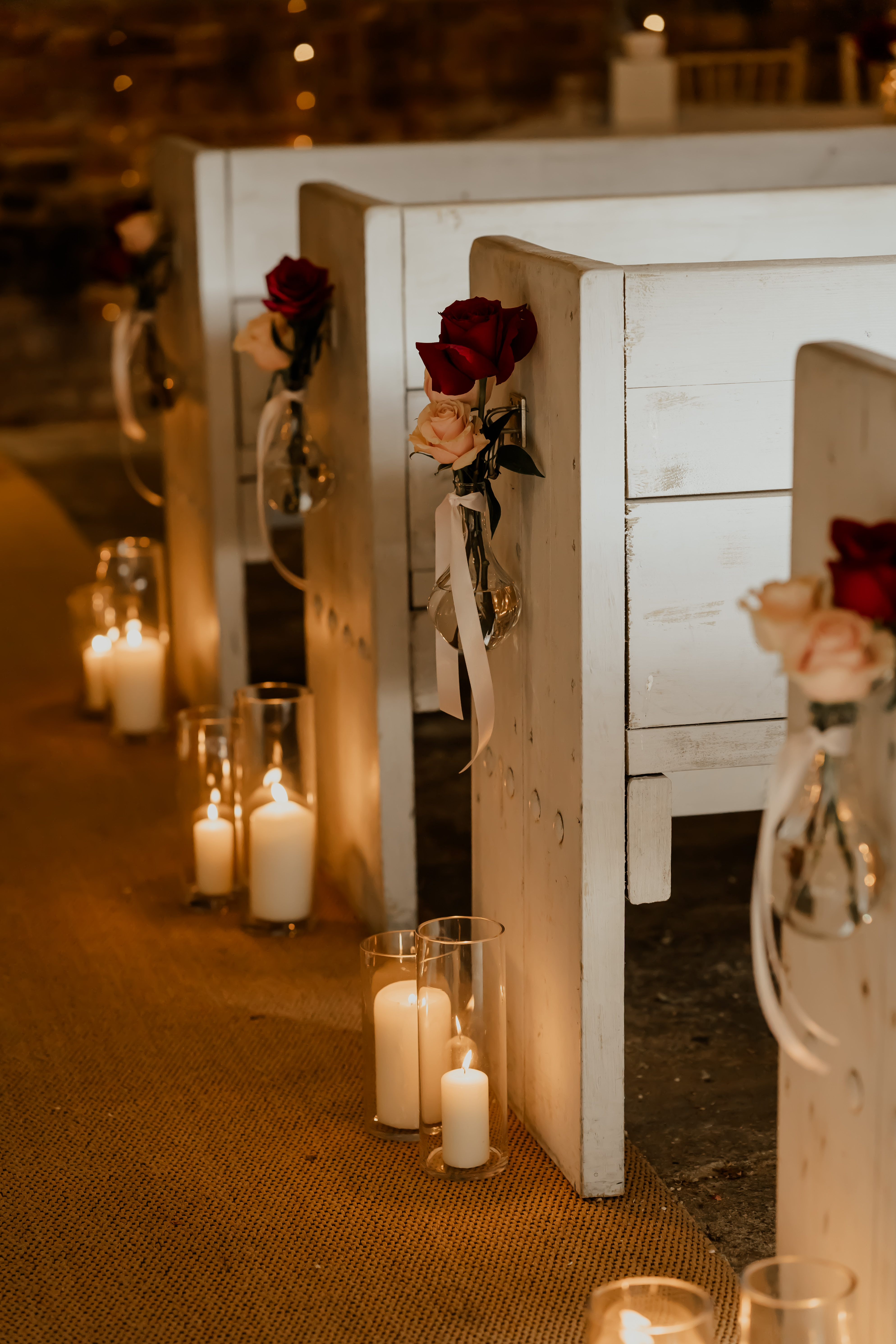 LaurenAndChris-43 (1) wedding aisle pew end flowers with ribbons and candles